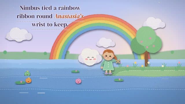 A felt child by a lake under a rainbow with a smiling cloud